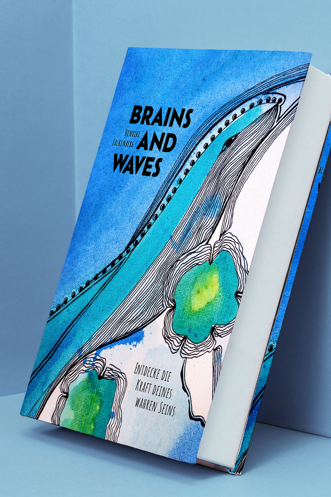 Das Buch ist als Mockup an der Wand präsentiert